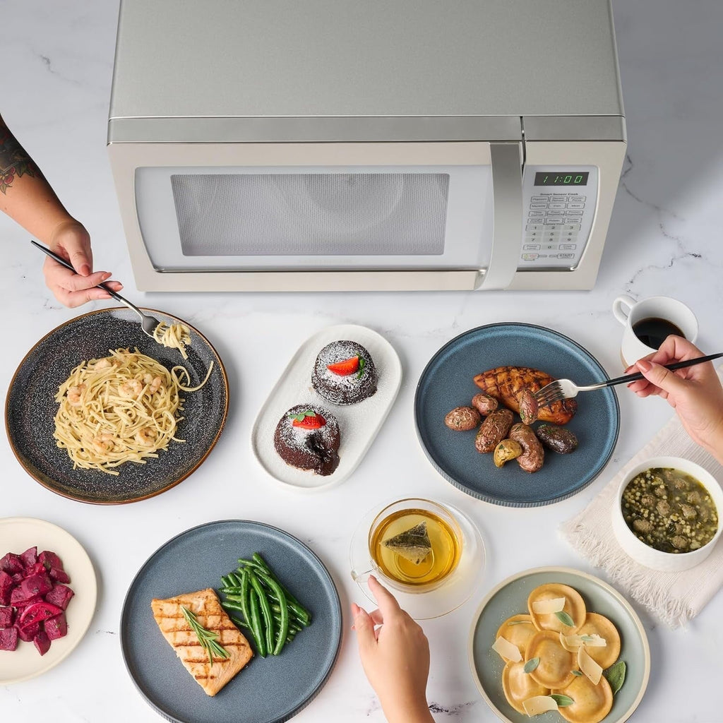 Farberware Professional 1.3 Cu. Ft. 1100-Watt Microwave Oven with Smart Sensor Cooking, White and Platinum