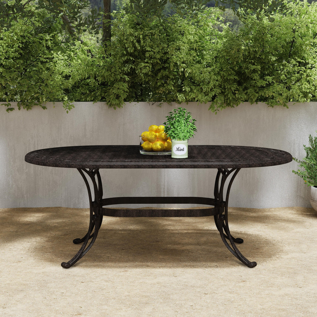 Sanibel Bronze Aluminum 7- Piece Outdoor Dining Set with 72 Oval Dining Table and Six Armchairs by Homestyles